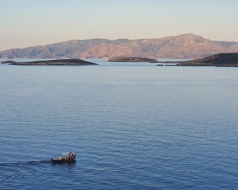 seascape of small islands and a fishing boat