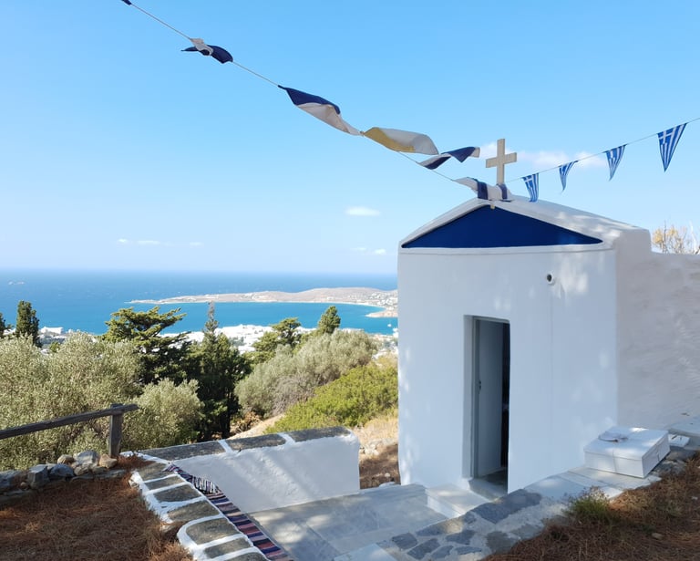a chapel on a hill overlooking the sea