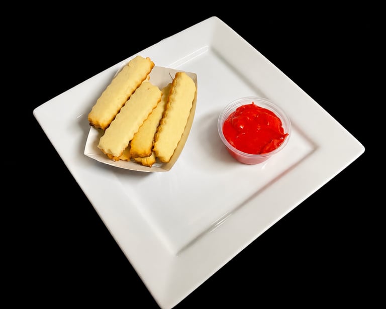 Sugar cookies Fries with a buttercream ketchup.