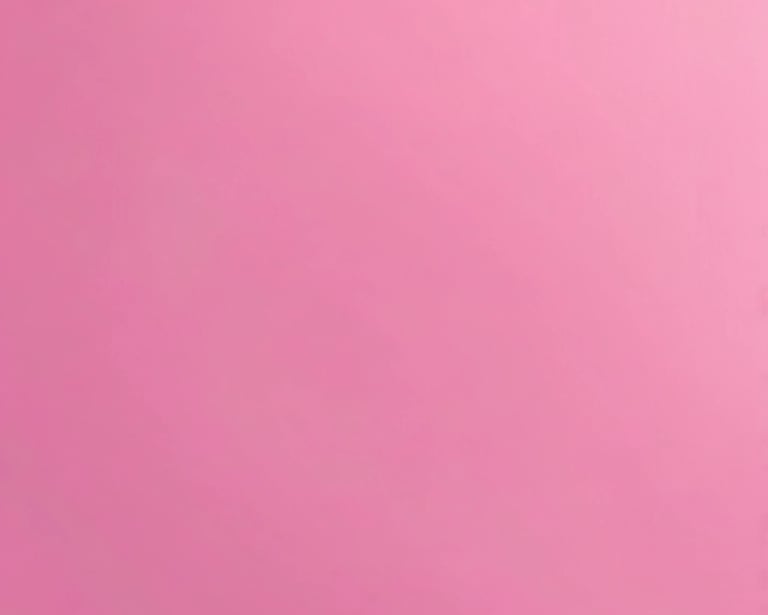 A cozy room with soft pink lighting and a small group gathered in prayer.