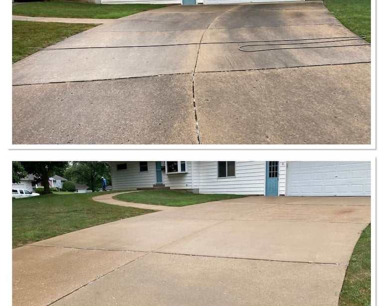 Discoloration removed after our driveway pressure washing service in Holiday, FL