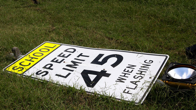 Speed limit sign on the ground