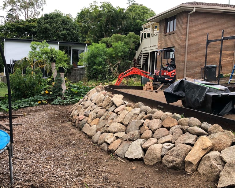 Recycled rocks from side path, sleepers from P1, mulch from trees.