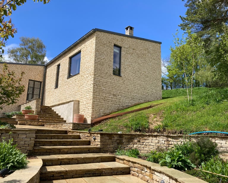 Cotswold stone-faced extension built using long-lasting traditional techniques