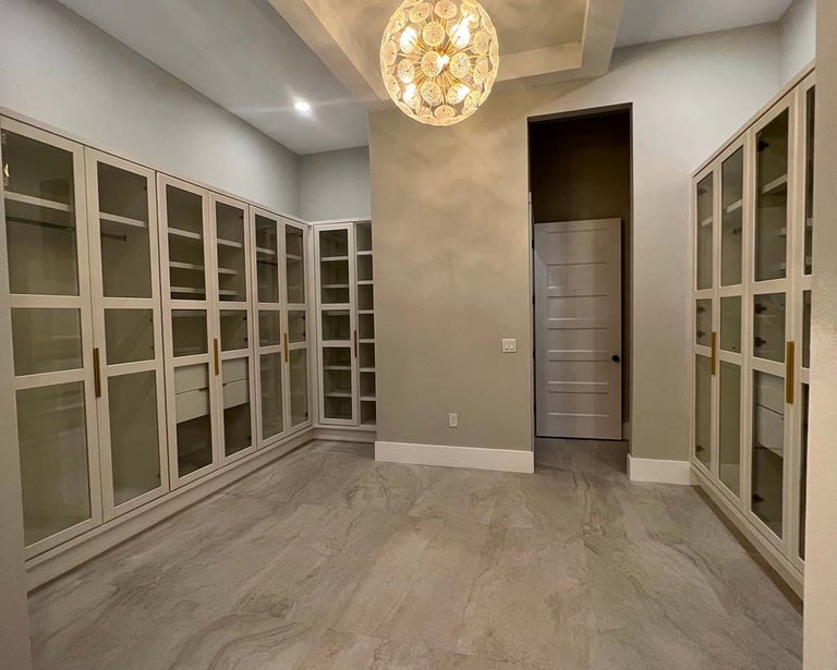 Picture of walk-in closet created by White and Wood Custom Carpentry in Orlando Florida