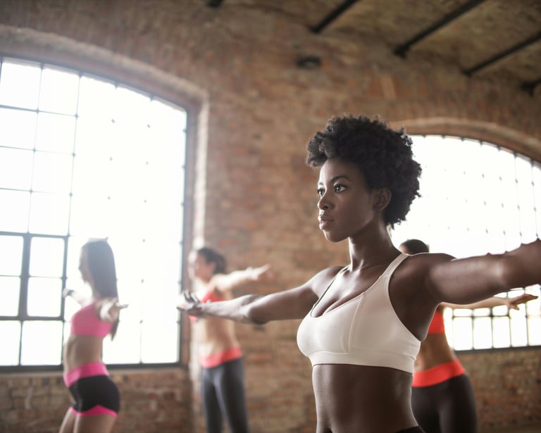 a woman and man exercising for improved energy and advanced focus