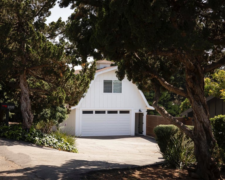 a garage with a garage door and a garage door
