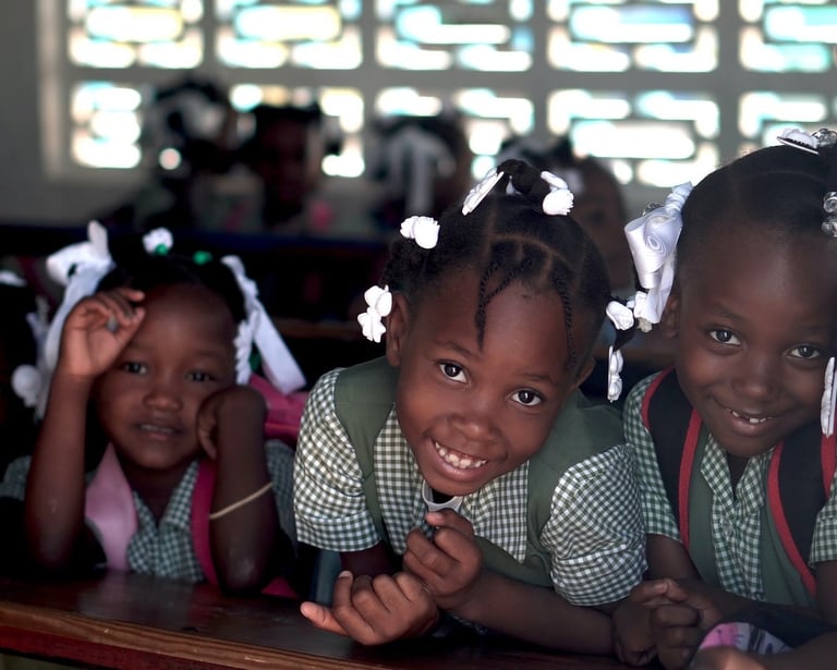 Group of young girls accessing education through an NGO program.