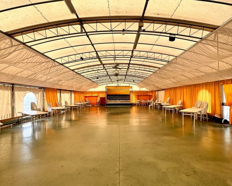a large room with a lot of chairs and tables