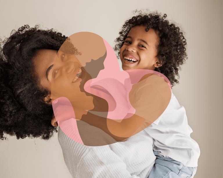 a woman holding a child in her arms