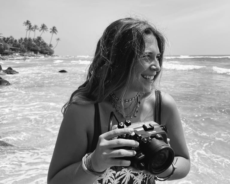 woman beach smiling with camera
