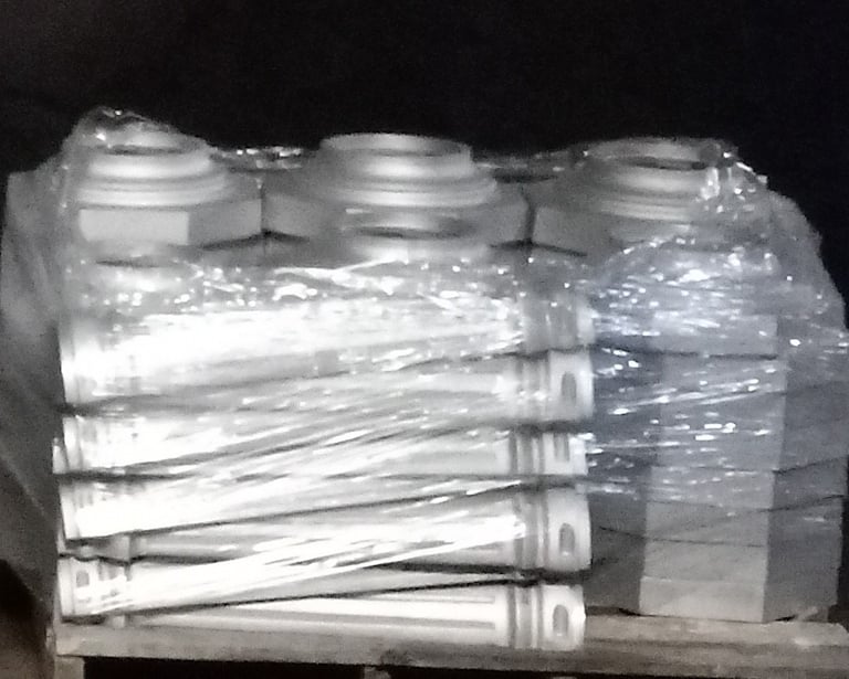 Custom cast aluminum pole covers and bases