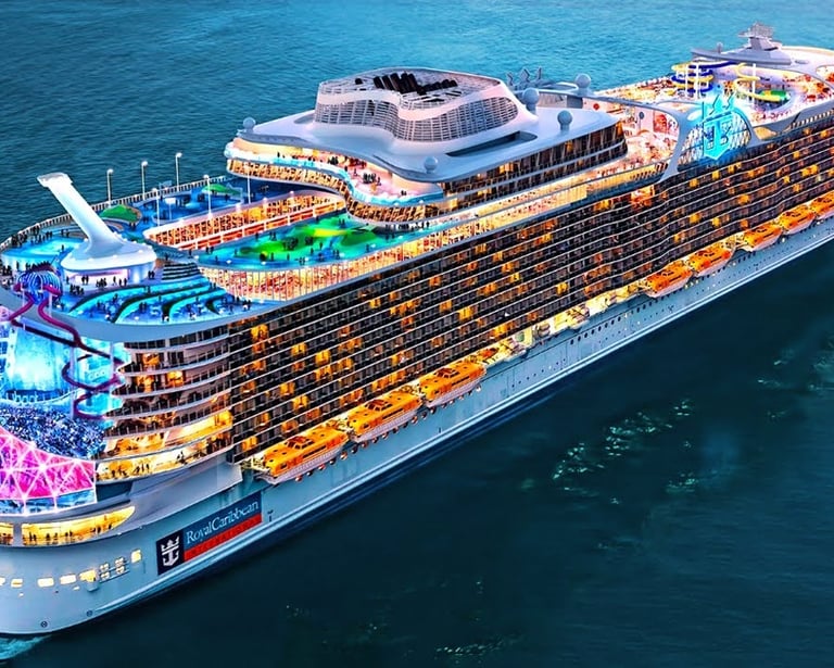 a cruise ship with a large cruise ship in the water