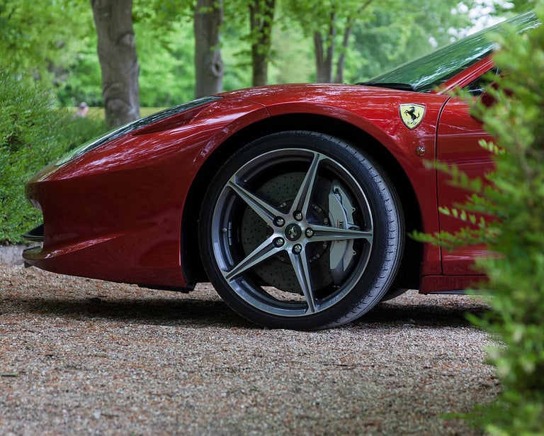 Front of a Ferrari from behind a hedge at Goodwood Breakfast Club Supercar Sunday 2017