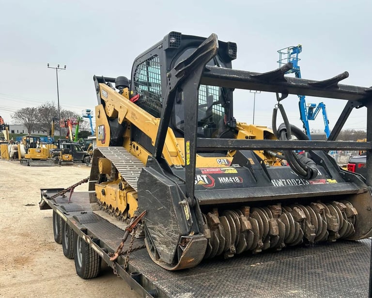 skid steer with mulching attachment