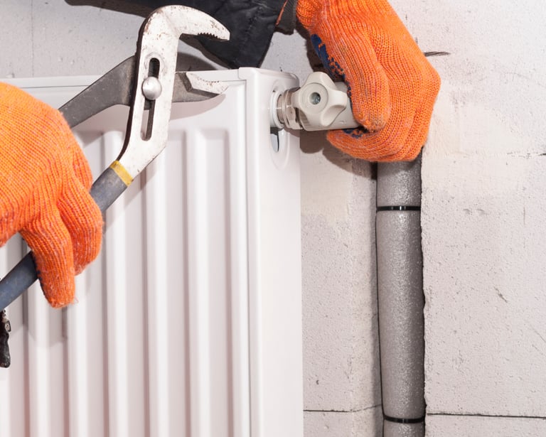 Installation de radiateur avec Karukera Plomberie pour un chauffage efficace.