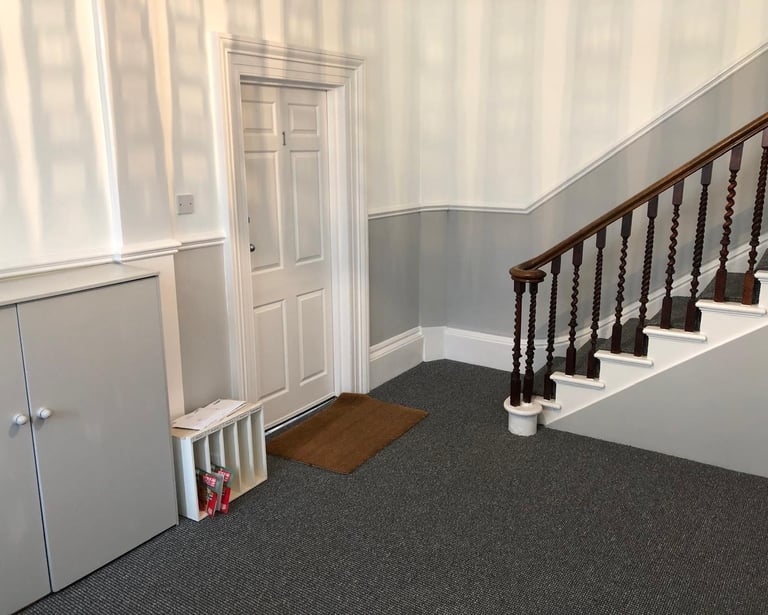 Professional hallway and staircase painting in Hassocks Sussex, grey and white interior