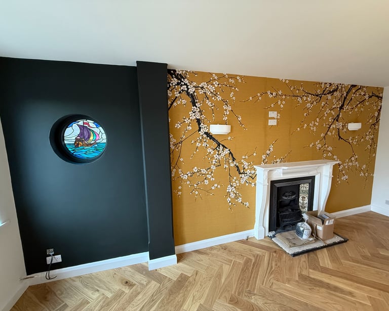 Custom painted feature wall in Brighton Sussex, dark green and mustard mural with fireplace
