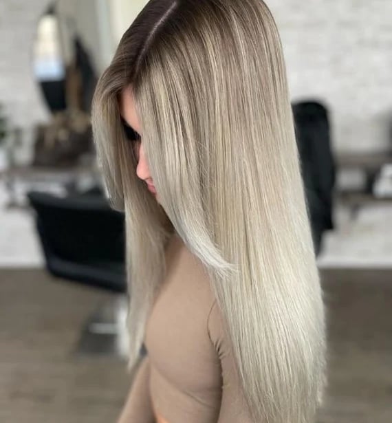 Woman wearing straight style wig