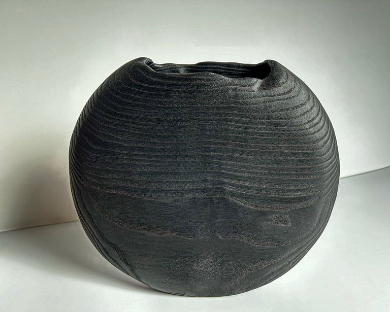 Hollow ash vessel. Charred wood. Yakisigi, shou Sugi ban finish.