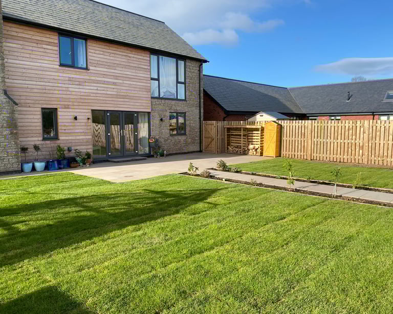 picture of house in malvern with back garden landscaped by Lakes building and plastering services
