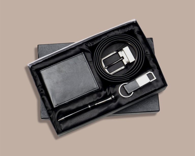 Premium corporate new joinee kit with a leather belt, matching wallet, and sleek pen.