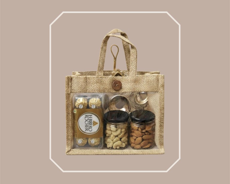 Sustainable jute tote gourmet food hamper with chocolates and dry fruit jars.