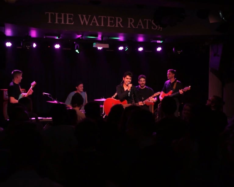 Olly Williams performing live with band at The Water Rats music venue London