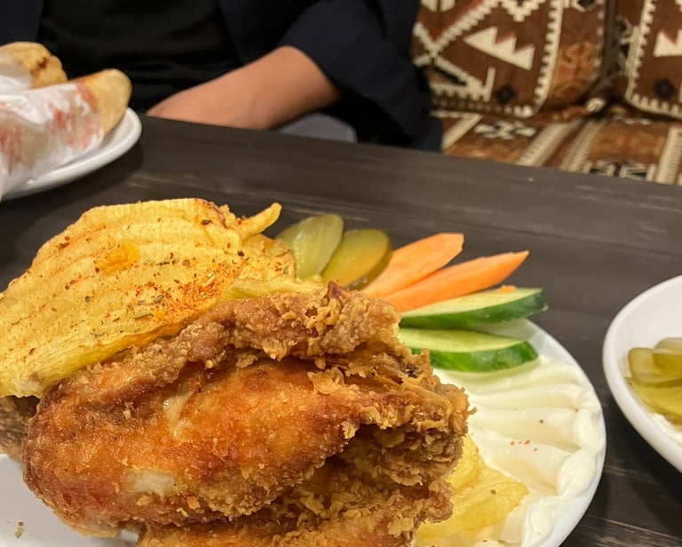 a plate of fried chicken on a table