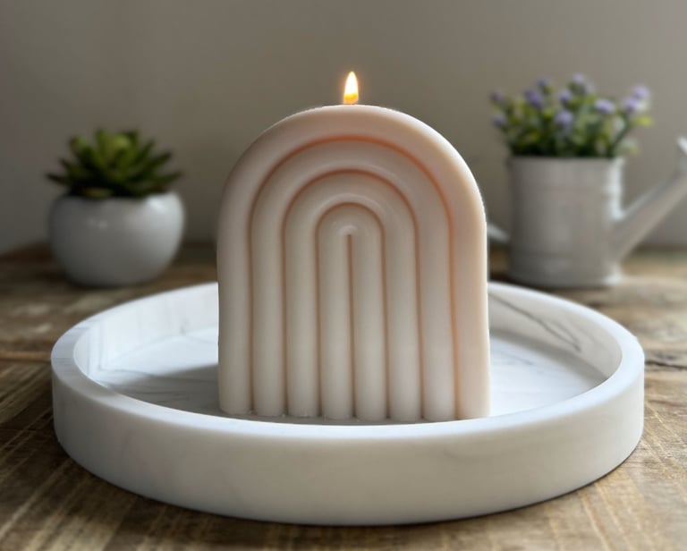 Arch candle lit over a plate