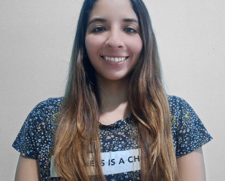 Professional psychologist smiling for a photo in formal wear