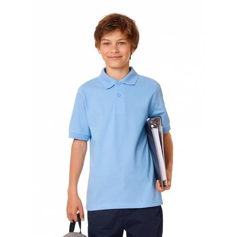 a boy in a blue shirt holding a tennis racket