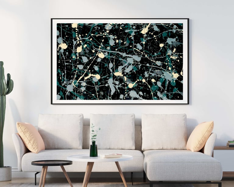 a couch with an splatter abstract painting of a black and white paint