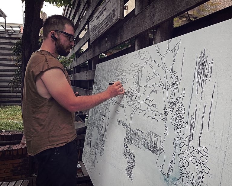 artist Evgeny Bondarenko sketching mural in Taiwan