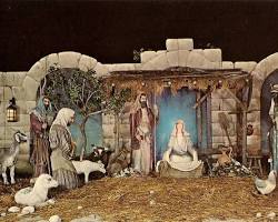Elaborate nativity scene with Jesus, figures, and backdrop