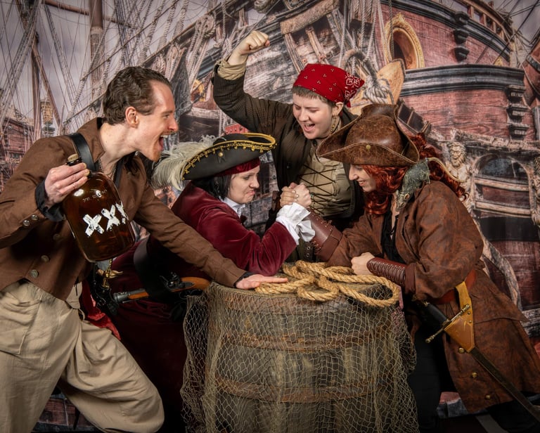 Shank Painters having an arm wrestling match, four pirates shouting