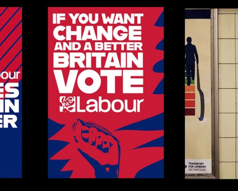 a group of banners with a clock tower in the background