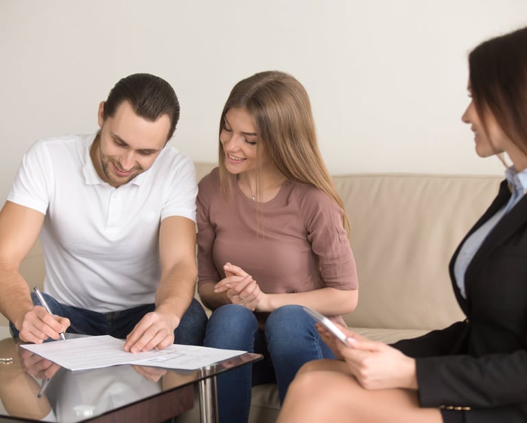 a man and woman sitting on a couch
