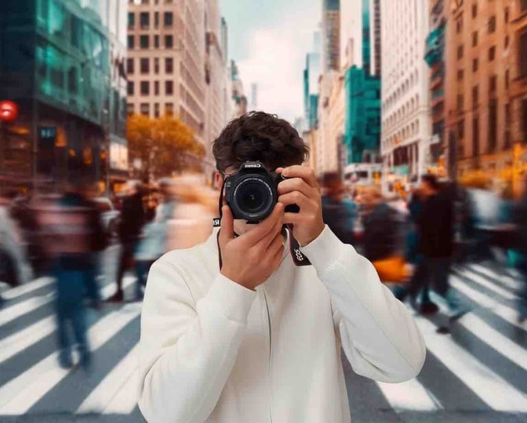 a man taking a picture of a camera with a camera