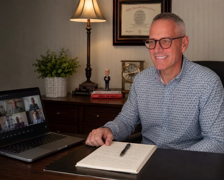 Doug working from his home office.