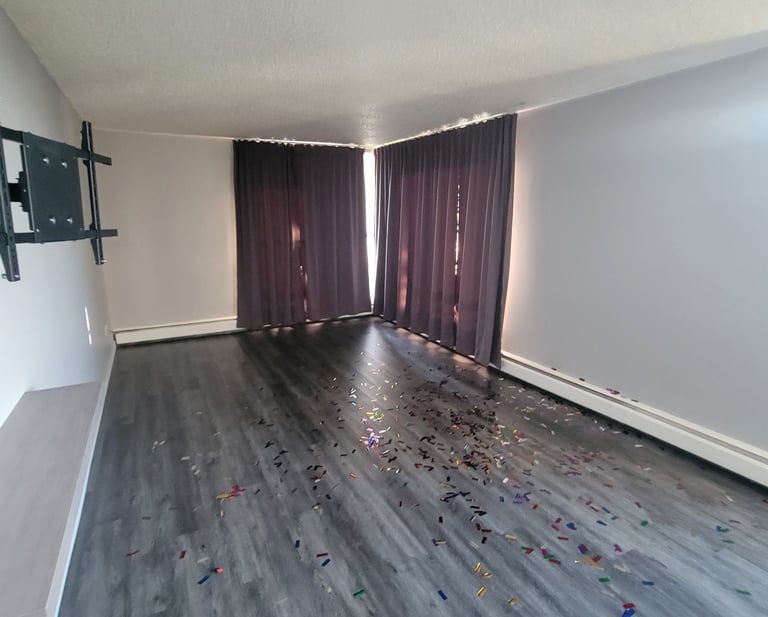 a room with a tv and a tv screen whit good space to make a private room