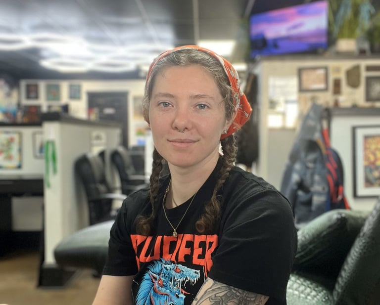 a woman tattoo artist profile picture