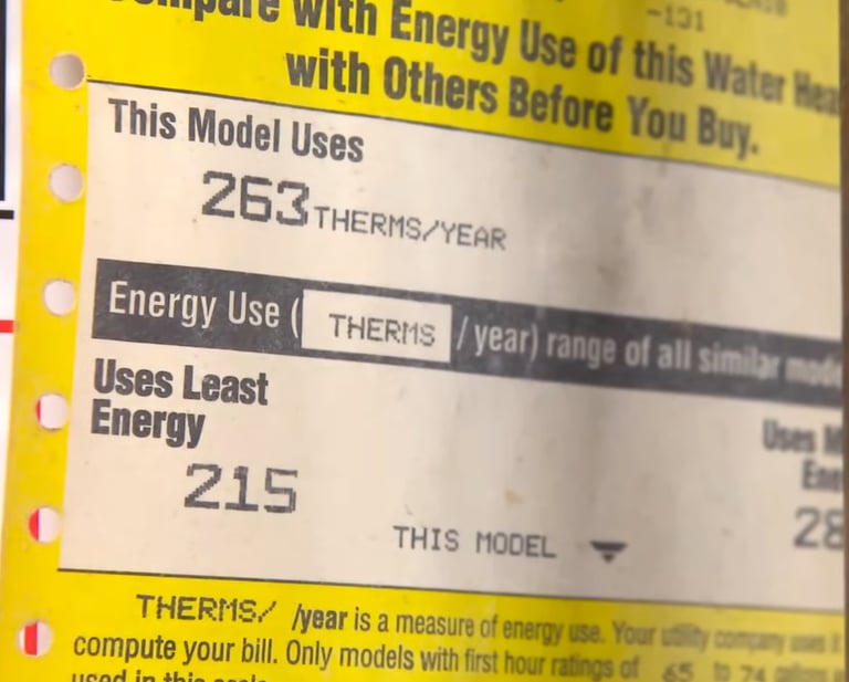 Yellow Energy Guide label on a water heater showing energy use of 263 therms per year.