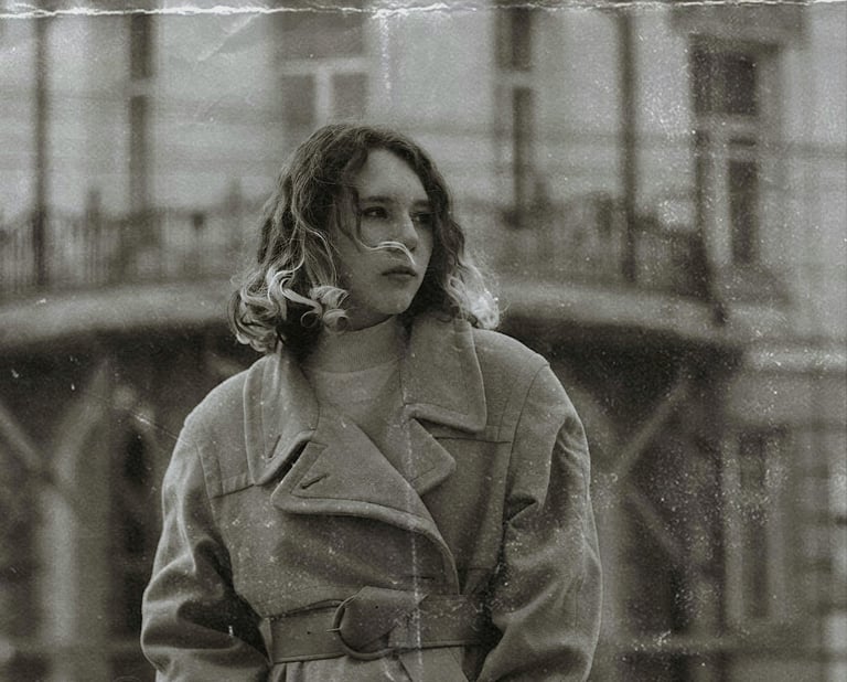 Old photo to be restored of a lady in a street