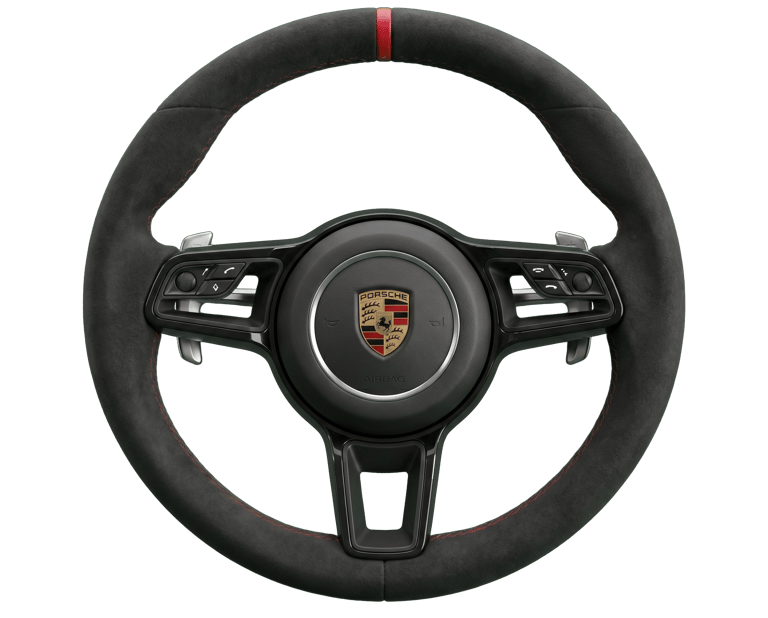 A black Alcantara Porsche steering wheel with red stitching and a 12 o'clock racing stripe.