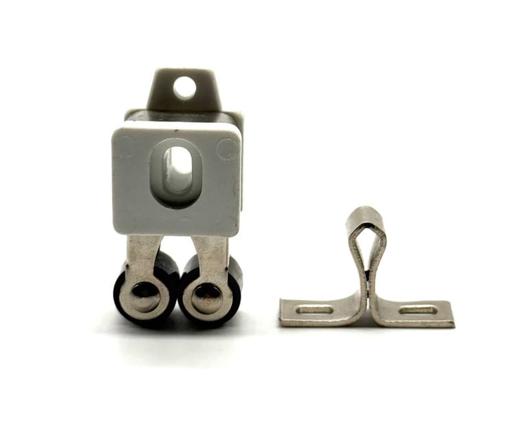 cricchetto per mobili