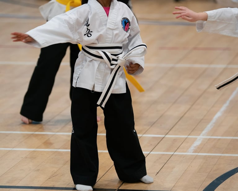 A five year old practising martial arts in our horley classes.