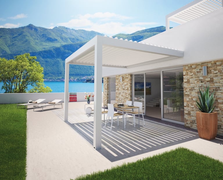 a patio with a table and chairs and a table