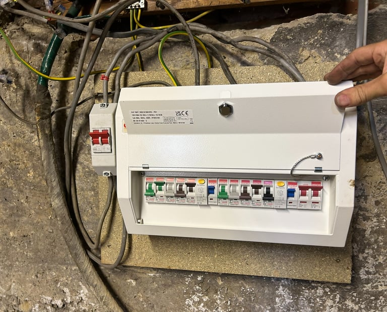 All new consumer unit with 10 circuits. Isolation switch also added.