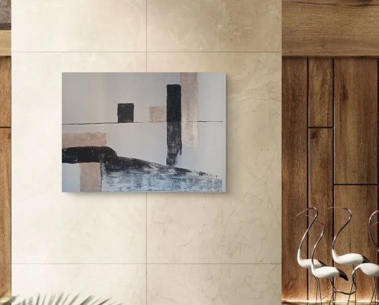 Modern abstract wall art featuring black and beige geometric shapes in a luxury minimalist interior.